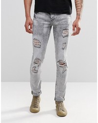 Мужские серые рваные зауженные джинсы