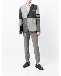 Мужской серый пиджак в стиле пэчворк от Thom Browne