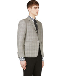 Мужской серый пиджак в шотландскую клетку от Thom Browne