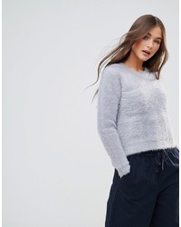 Женский серый пушистый свитер с круглым вырезом