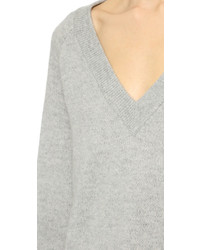 Серый свободный свитер от Alexander Wang