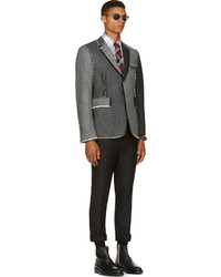 Мужской серый шерстяной пиджак с узором "в ёлочку" от Thom Browne