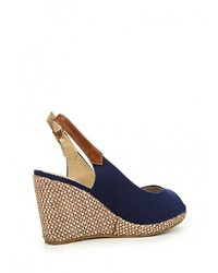 Синие босоножки на танкетке от Raxmax