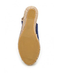 Синие босоножки на танкетке от Raxmax