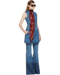 Синие джинсы-клеш от Alexander McQueen