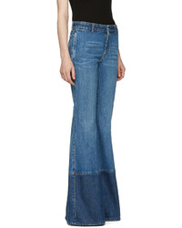 Синие джинсы-клеш от Alexander McQueen