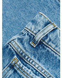 Синие джинсы-клеш от Maison Margiela