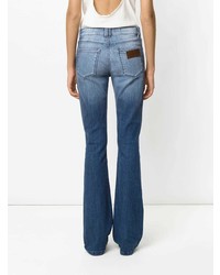 Синие джинсы-клеш от Amapô