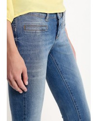 Синие джинсы-клеш от Motivi