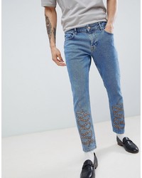 Мужские синие джинсы с принтом от ASOS DESIGN