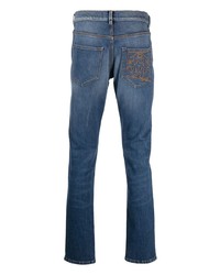 Мужские синие зауженные джинсы с вышивкой от Roberto Cavalli