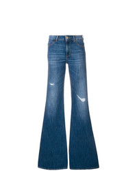 Синие рваные джинсы-клеш от Dondup