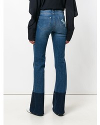 Синие рваные джинсы-клеш от RED Valentino