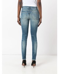 Синие рваные джинсы скинни от Saint Laurent