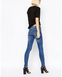 Синие рваные джинсы скинни от Cheap Monday