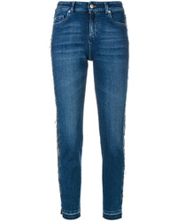 Женские синие рваные джинсы от Alexander McQueen