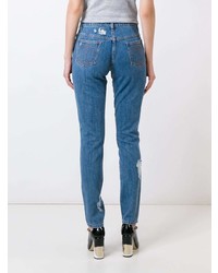 Женские синие рваные джинсы от Moschino