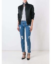 Женские синие рваные джинсы от Moschino