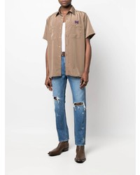 Мужские синие рваные джинсы от Needles