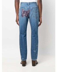 Мужские синие рваные джинсы от Needles