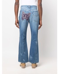 Мужские синие рваные джинсы от Needles