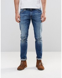 Мужские синие рваные джинсы от Wrangler