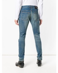 Мужские синие рваные зауженные джинсы от Balmain