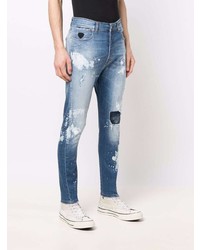 Мужские синие рваные зауженные джинсы от John Richmond