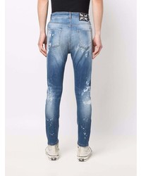 Мужские синие рваные зауженные джинсы от John Richmond