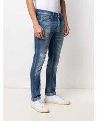 Мужские синие рваные зауженные джинсы от Dondup