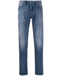 Мужские синие рваные зауженные джинсы от Emporio Armani