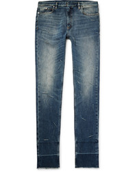 Мужские синие рваные зауженные джинсы от Maison Margiela