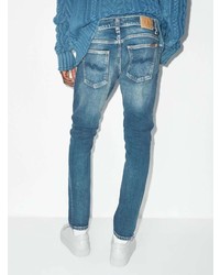 Мужские синие рваные зауженные джинсы от Nudie Jeans