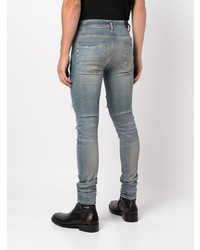 Мужские синие рваные зауженные джинсы от Amiri