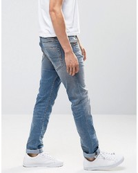 Мужские синие рваные зауженные джинсы от Diesel