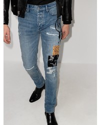Мужские синие рваные зауженные джинсы от Ksubi