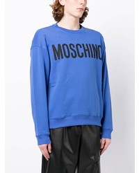 Мужской синий свитшот с принтом от Moschino