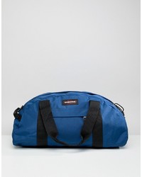 Мужская синяя дорожная сумка из плотной ткани от Eastpak