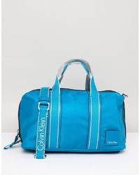 Женская синяя кожаная спортивная сумка от Calvin Klein