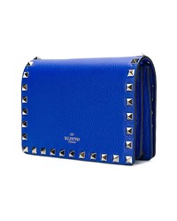 Синяя кожаная сумка через плечо с шипами от Valentino