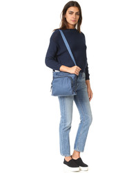 Женская синяя сумка от Tumi