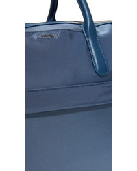 Женская синяя сумка от Tumi