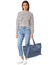 Женская синяя сумка от Tumi