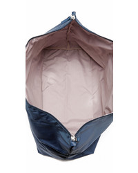 Женская синяя сумка от Tumi