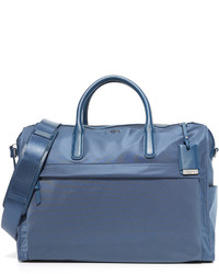 Женская синяя сумка от Tumi