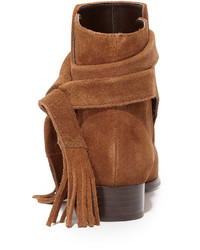 Табачные замшевые ботильоны от Schutz