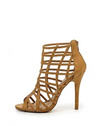 Табачные кожаные босоножки на каблуке от Spurr