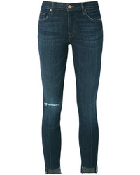 Темно-бирюзовые рваные джинсы
