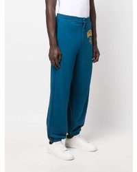 Мужские темно-бирюзовые спортивные штаны от Moschino