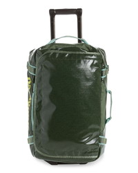 Темно-зеленая кожаная дорожная сумка